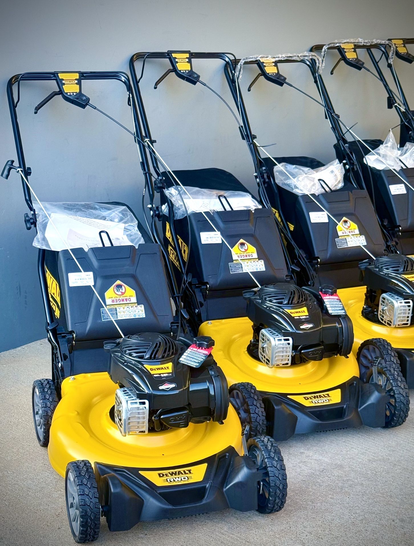 Brand new Dewalt 21 in. 150cc Briggs and Stratton 625ex Engine Rear Wheel Drive 2-in-1 Gas Self Propelled Walk Behind Lawn Mower