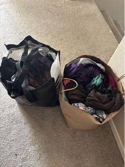 Two bags of teen girls clothes in size small. Some athletic wear dresses.