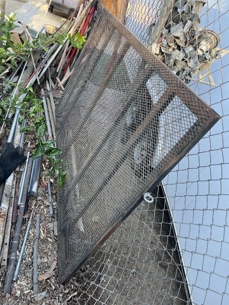 Selling TRAILER GATE WITH .METAL GRATE EXPANDED METAL SIZE 80 1/2 INCHES BY48 INCHES FOR TRAILER 400 OBO GOOD SHAPE