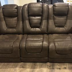 Set of 2 Reclining Power Sofas w/adjustable head rests