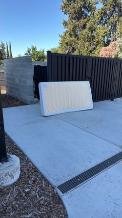 Twin bed and mattress