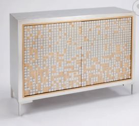  2 doors, 1 shelf Cabinet 48x16x36" Finish: Silver case, silver incised grid with gold accents