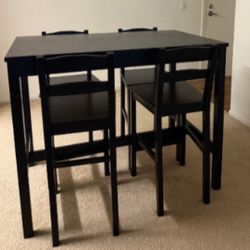 Dining Table And Four Chairs