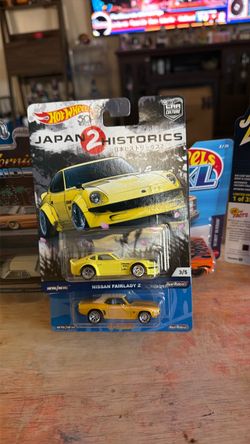 Hot Wheels Nissan fair lady z & 69 Camaro P3