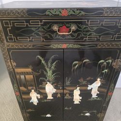 Black Lacquer cabinet with Pearl Inlays. 36" High 24" Wide