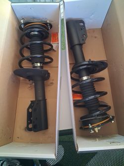 Gm front struts and Buick enclave headlights 2000-2005