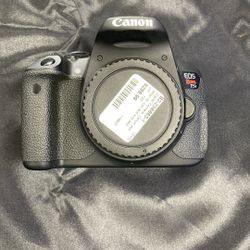Canon EOS Rebel T5i DSLR camera body. 