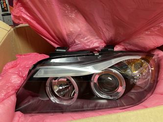 E90 BMW OEM New Headlights with HALOs