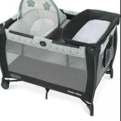 The Graco  Pack'n Play Care Suite Playard. 