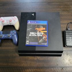 PS4 with two controllers, COD Black ops 6 and 4 TB external drive | Trade for older gaming laptop