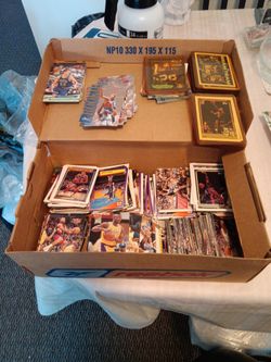 A variety of sports cards basketball, hockey, football