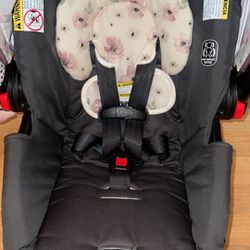 GRACO CAR SEAT , (Color) Purple/white With Flowers.  