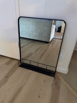 Black trim bathroom mirror