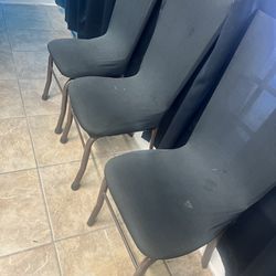 4  Chairs With Covers 