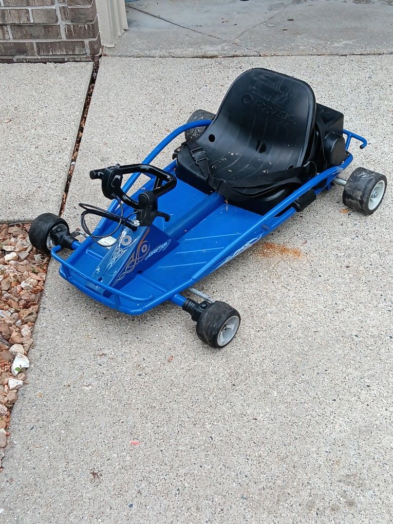 New battery is new charger razor ground force Drifter go kart for kids 4 years and up 15 miles an hour. 23 Mile and card Macomb Township Michigan