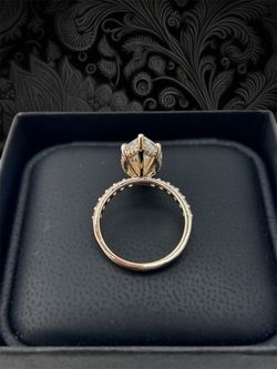 Marquise shape diamond and half way diamond Ring
