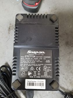 Snap on battery charger