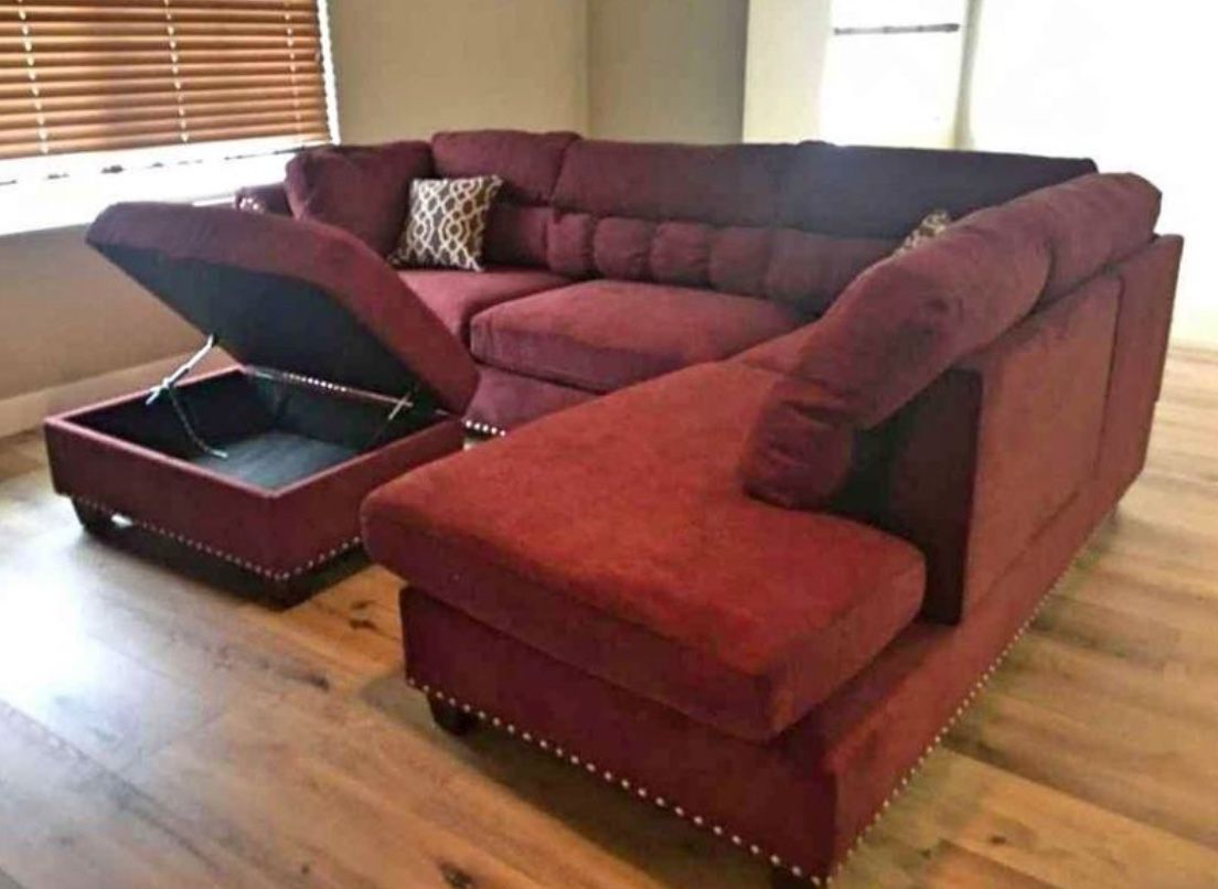 Brand new red Velvet like Sectional Sofa with storage ottoman and 2 accent pillows.