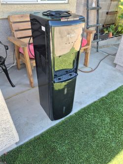 Primo water dispenser// bottom loading- in good condition,  works perfectly
