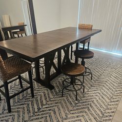 Pottery Barn solid wood high top adjustable dining table, including 4 metal barstool and 2 wicker barstools