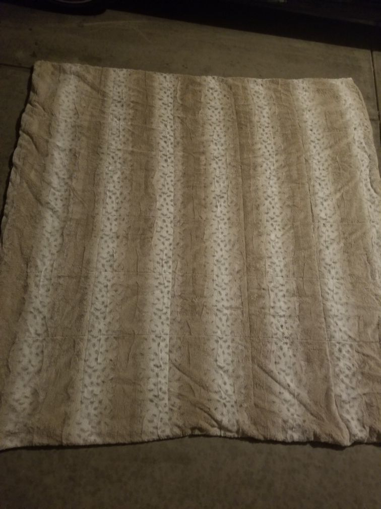 Faux fur throw blanket . 60x70. We got 2 for Christmas so selling the extra one. $20. Retails for $50