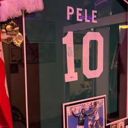 signed and worn pele jersey 