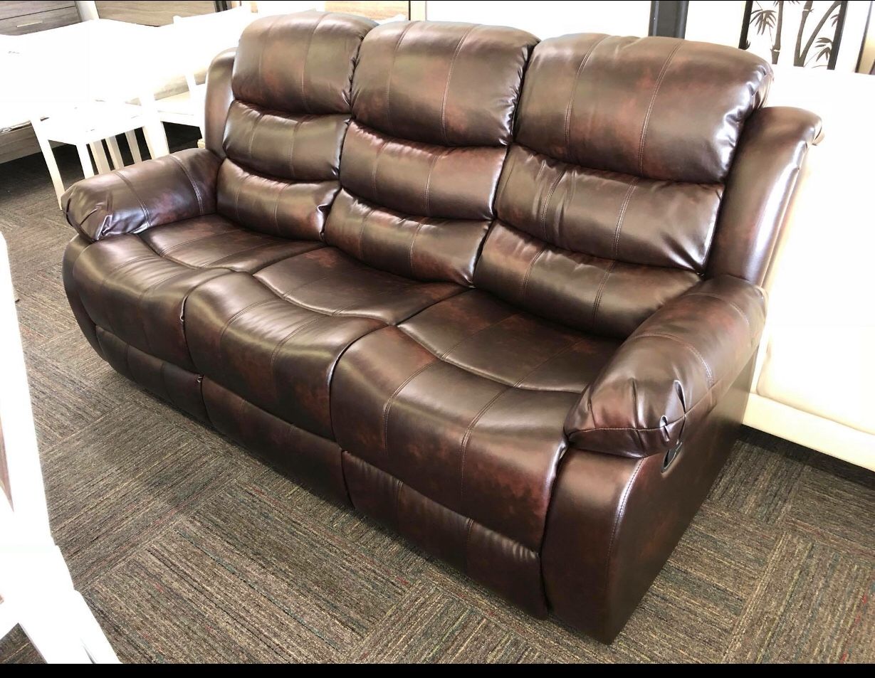 Reclining leather sofa and love seat