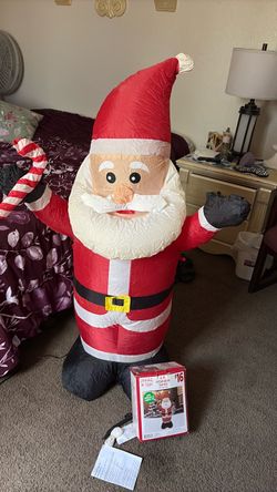 NEW,, lights inside to be seen at night,, Holiday Style Inflatable Santa Claus