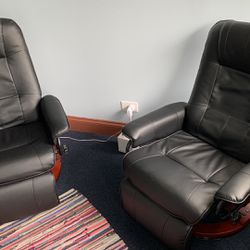 2 Leather Swivel Recliners 