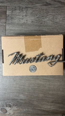 Vintage Ford mustang chrome script emblem