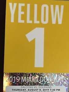 1 yellow dolphins parking pass