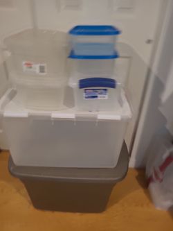 Assorted plastic storage bins, 7 in total.