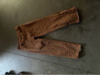 Tan designer jeans