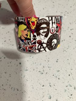 Metal cuff with punk collage