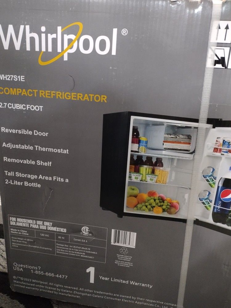 Whirlpool Refrigerator/ New and sealed.