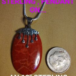 NATURAL CORAL AND STERLING SILVER, WITH A RAINDROP MOTIF. SUSPENDED ON 18-IN STERLING CHAIN. (NC-90124)