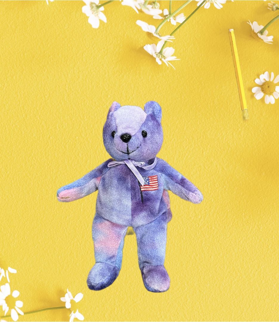 Ty beanie baby Freedom the bear.purple tie-dye bear w/ American flag on its chest collectible toy. 