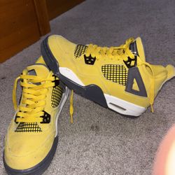 Yellow Thunder Jordan 4’s