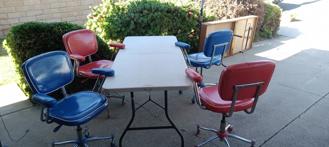 Downsizing, vinyl M C M / Vintage Rolling Chairs