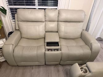 Cream leather couches & Large table