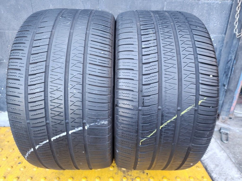 2 USED TIRES PIRELLI 305/35/20