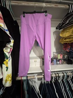 NIKE SWOOSH DRI FIT WOMEN'S RUNNING MID RISE 7/8 TIGHTS PURPLE