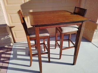 Nice table and two chairs. Brown. Great for home or apartment. Measurements are table 42-in high x 36-in wide. Chairs are 30 in high.