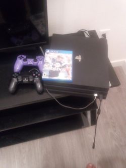 PlayStation 4 Pro 1TB (Black) with two controllers, connections and 1 Game Included