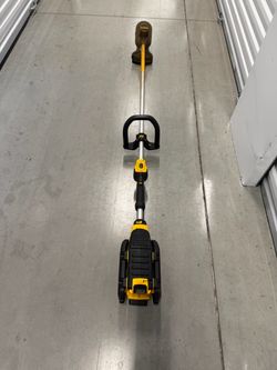 DeWalt DCST990 is a 40V MAX XR cordless, brushless string trimmer. Bare tool only. Bring a battery to test. Used in good cosmetic condition with norma