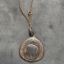 Antique vintage locket with design