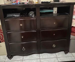Jerome’s full size bed frame and dresser ( dark brown)