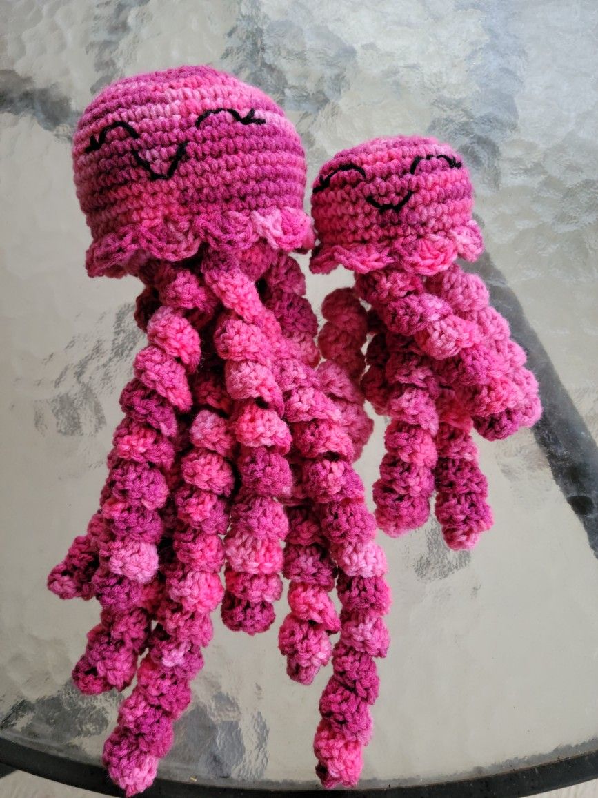 Crocheted mama and baby pink tones octopi