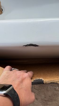 Metal tub slight damage shown in photos