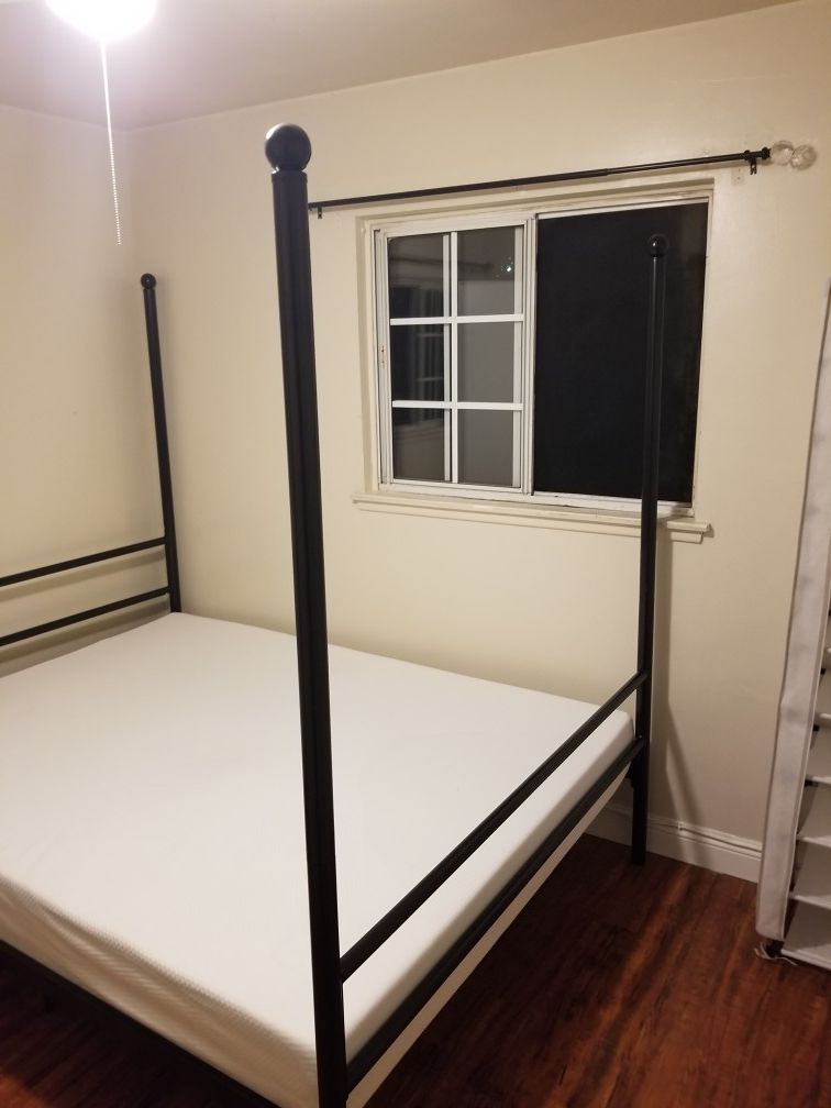 Queen bed with mattress and base